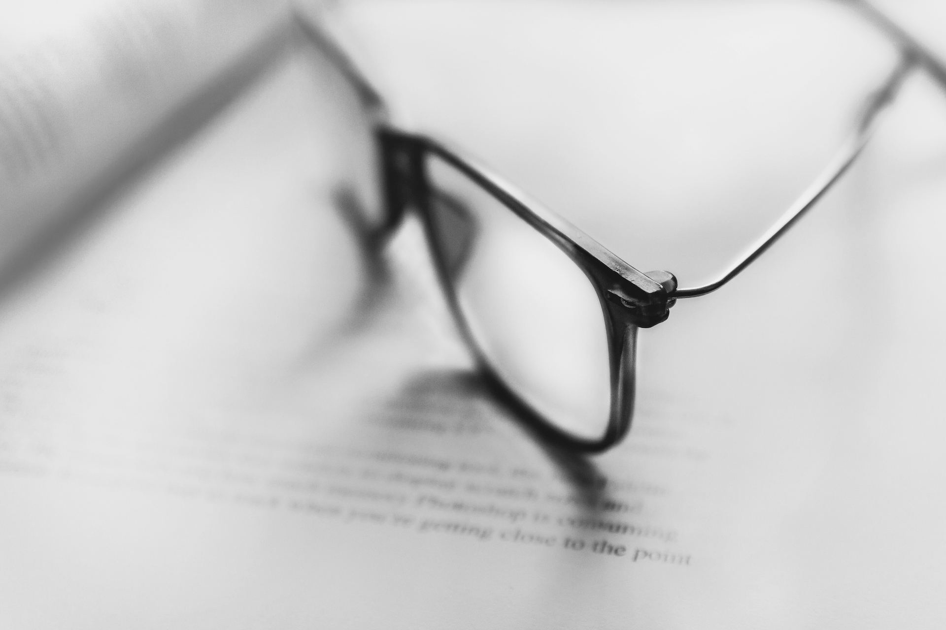 glasses bw glasses on book up close