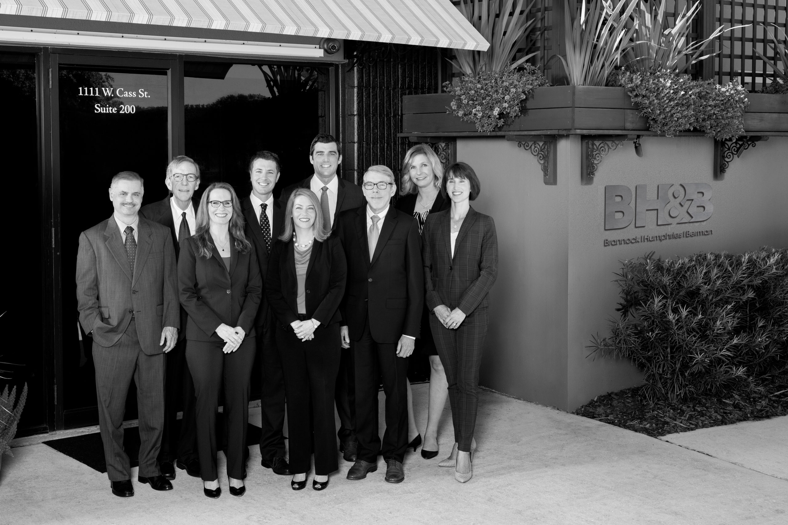 BW Team photo for homepage Attorney group picture in front of building